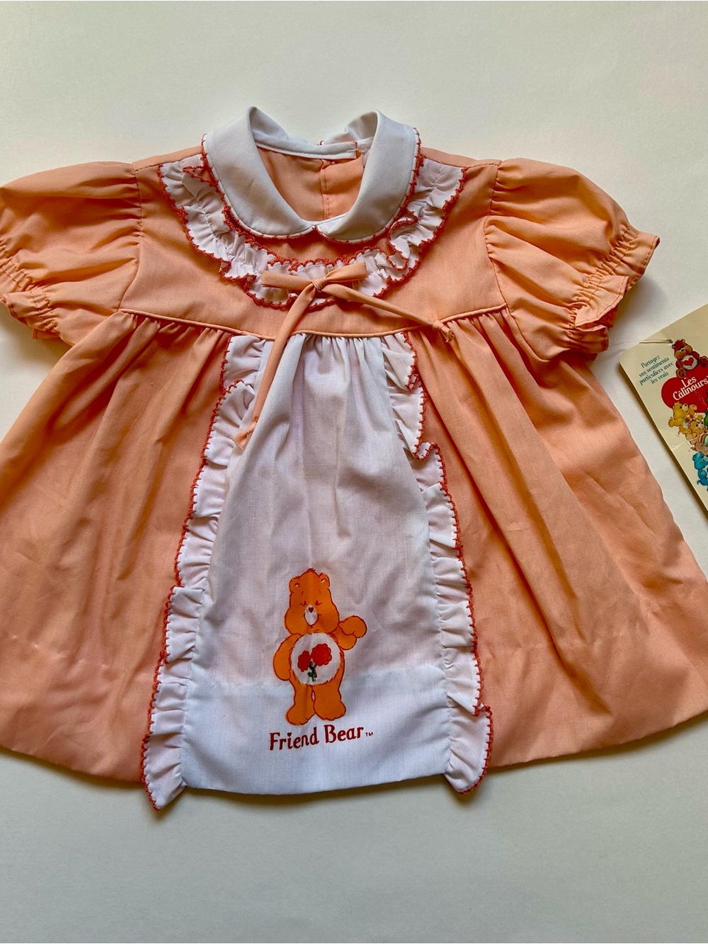 Vintage deadstock Care Bears Friend Bear Peach & White Ruffled Baby Dress